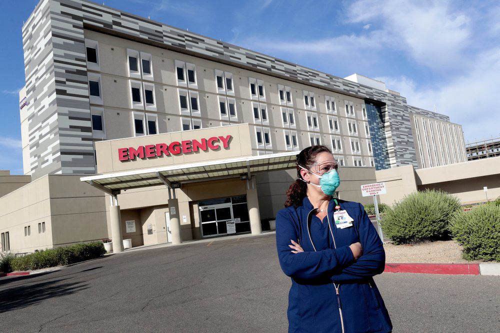 Caroline Maloney stands outside HonorHealth's Scottsdale Osborn Medical Center , Arizona, COVID